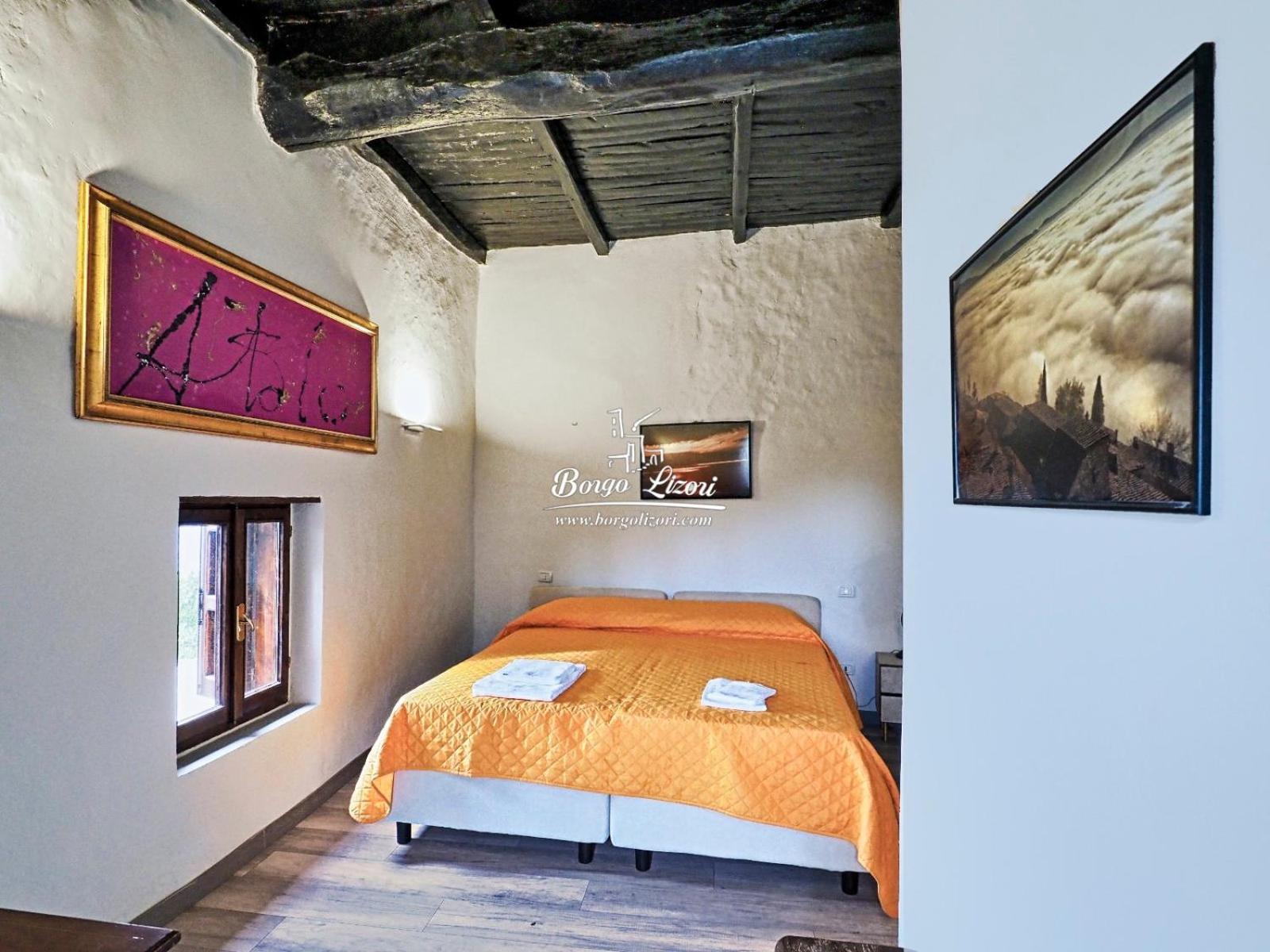 Relais Borgo Lizori Country House Кампело сул Клитуно Екстериор снимка