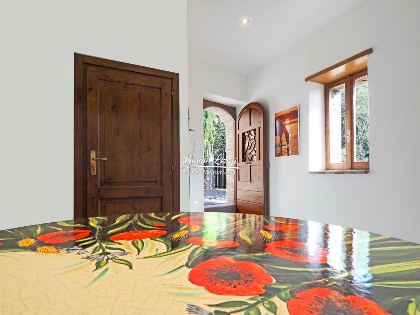 Relais Borgo Lizori Country House Кампело сул Клитуно Екстериор снимка