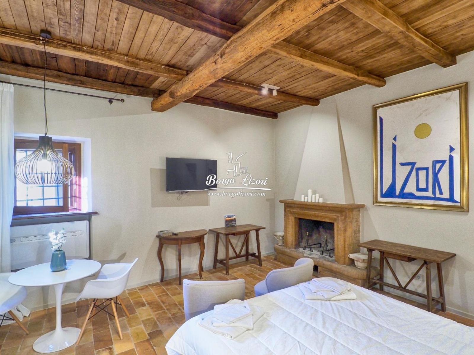 Relais Borgo Lizori Country House Кампело сул Клитуно Екстериор снимка